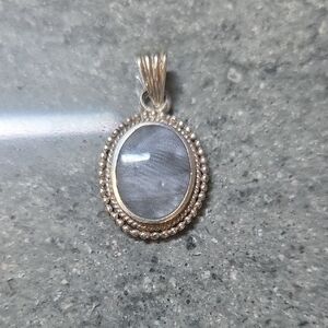 Elegant Silver Pendant with Gray Stone